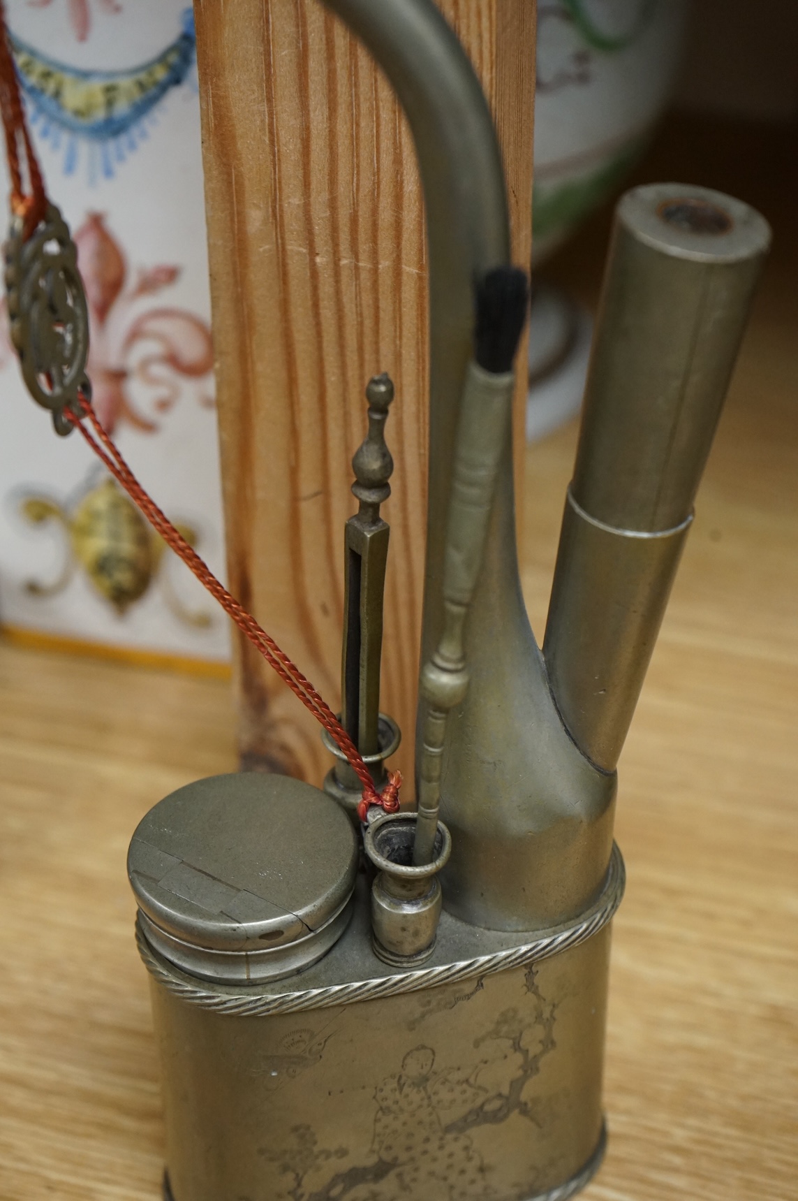 An early 20th century Chinese paktong water pipe, stamped maker’s mark, 26cm high